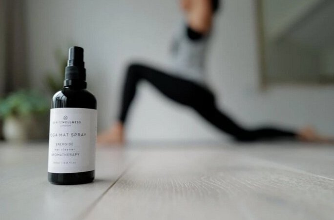 Aromatherapy yoga mat spray by Kati Kaia in a sleek black bottle, enhancing your mindful accessories collection