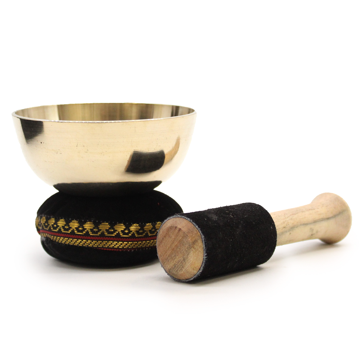Brass singing bowl with black cushioned handle and wooden mallet on a white background