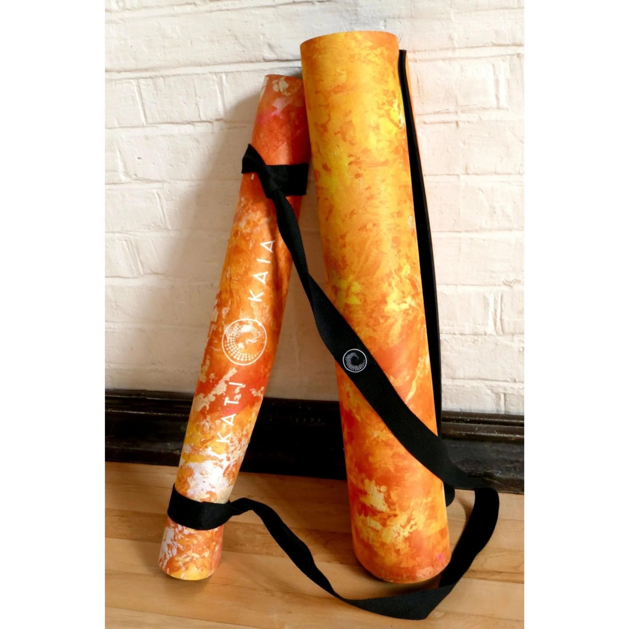 Kati Kaia artist luxury yoga mat bundle in orange and black, made from eco-friendly material, versatile for all yoga styles