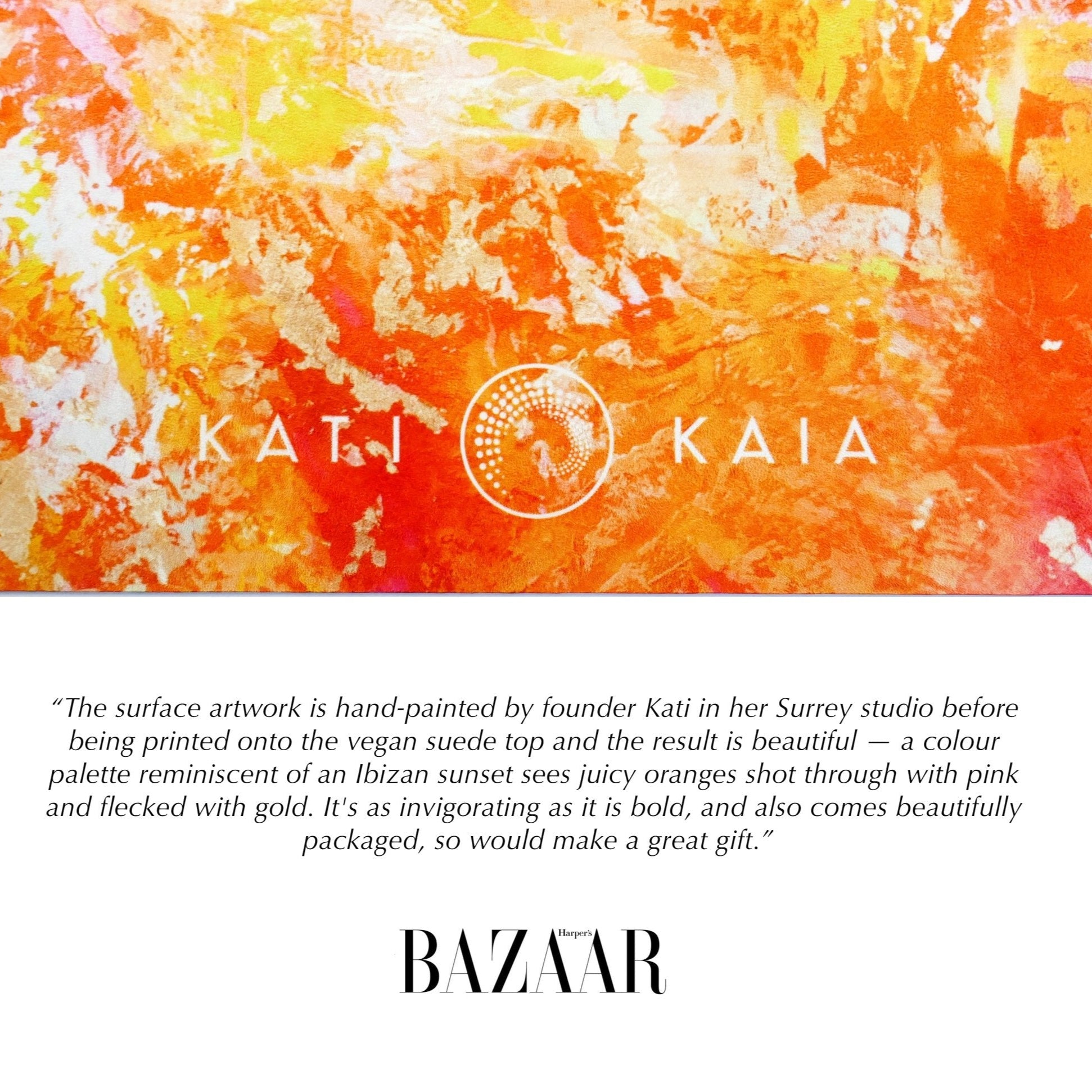 Kati Kaia orange travel yoga mat with vibrant hand-painted sunset-inspired design and gold flecks