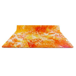 Kati Kaia orange travel yoga mat with vibrant abstract design and comfortable texture
