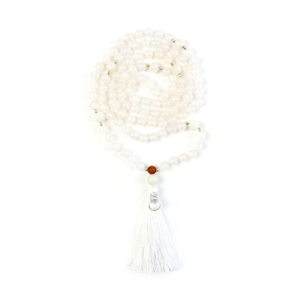 Kati Kaia crystal moonstone mala necklace with white beads and a white tassel for yoga meditation
