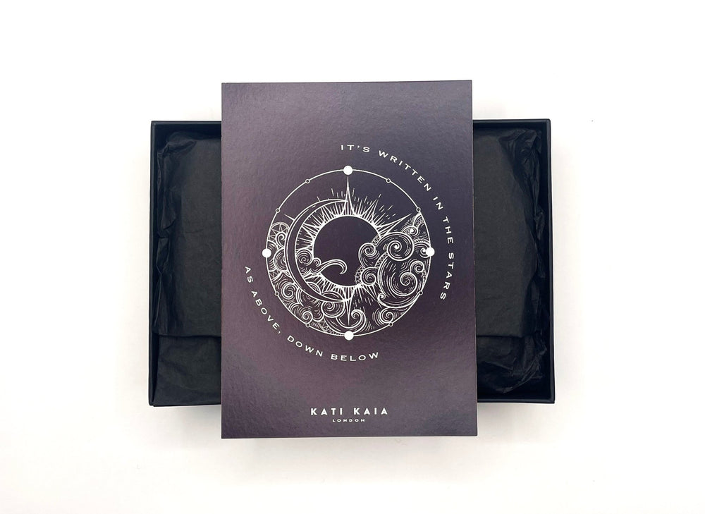 Kati Kaia mala bracelet and palo santo gift set in elegant black packaging with celestial design