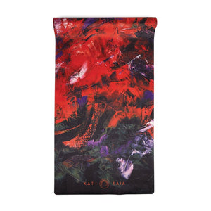 Kati Kaia portable yoga mat for travel with vibrant red and black abstract design