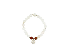 Selene purity mala bracelet by Kati Kaia with white beads, brown accents, and central pendant